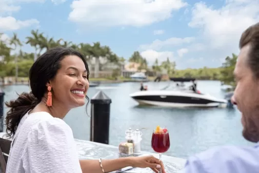 couple eating on the water