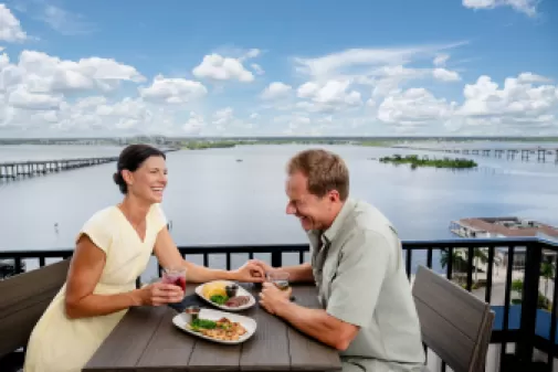 Enjoy dining and nightlife at waterfront rooftop bars and restaurants.