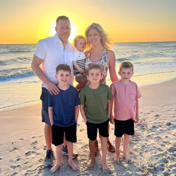 Sunset colors glow over the water in Fort Myers Beach.